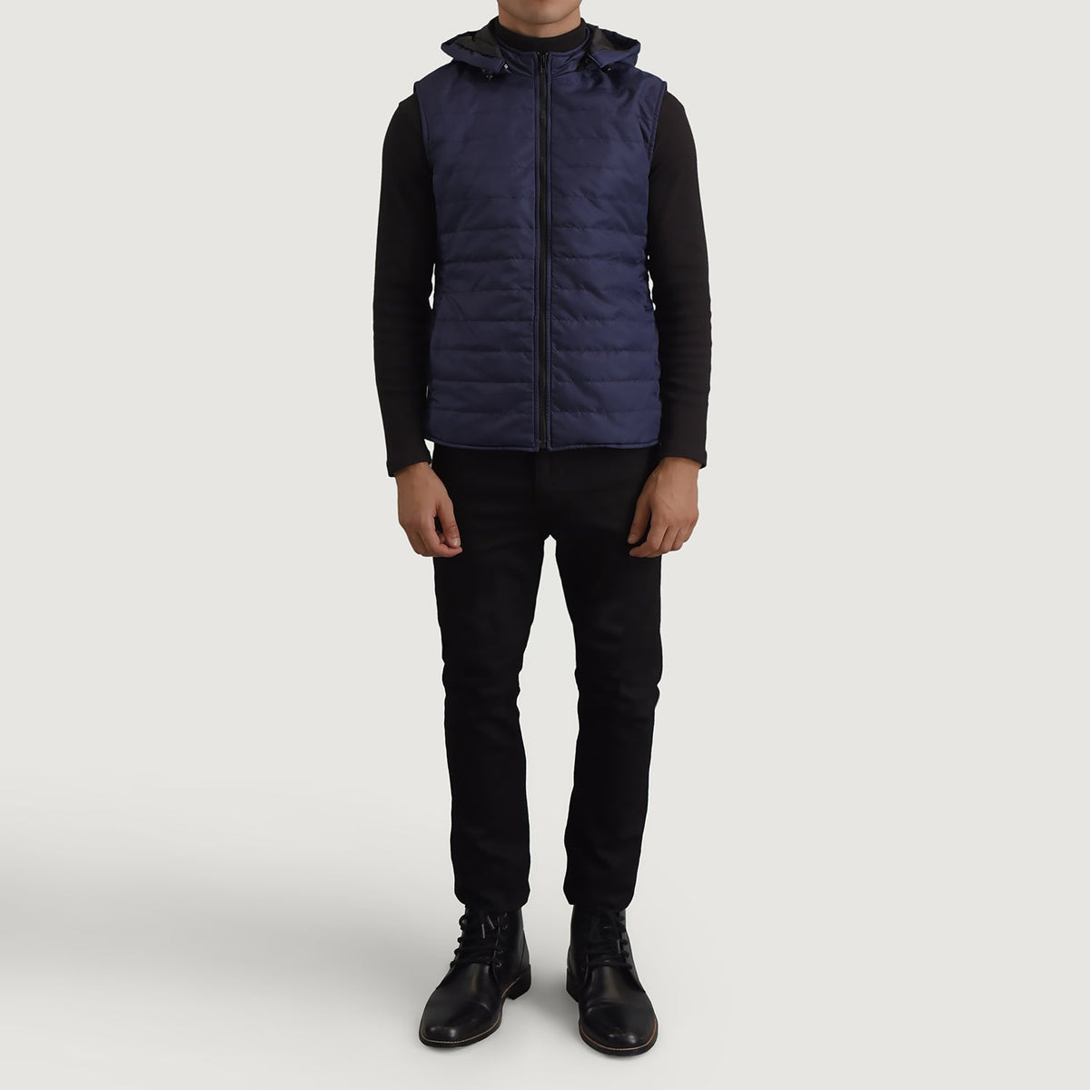
Carlo Blue Hooded Puffer Vest - Lateral Side Profile View Showing Sleeve Cut & Athletic Taper Fit