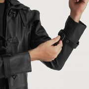 
Close-Up Detail of Shirt collar with a large hood & Belted Hardware on Huntsman Black Hooded Leather Trench Coat