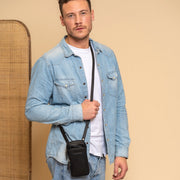 Valdes Full-Grain Leather Phone Bag - Lateral Side Profile View Showing Sleeve Cut &amp; Athletic Taper Fit