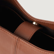 
Styled Fit Perspective of The Stefani Brown Leather Hobo Bag For Women on Model - Natural Daylight Drape